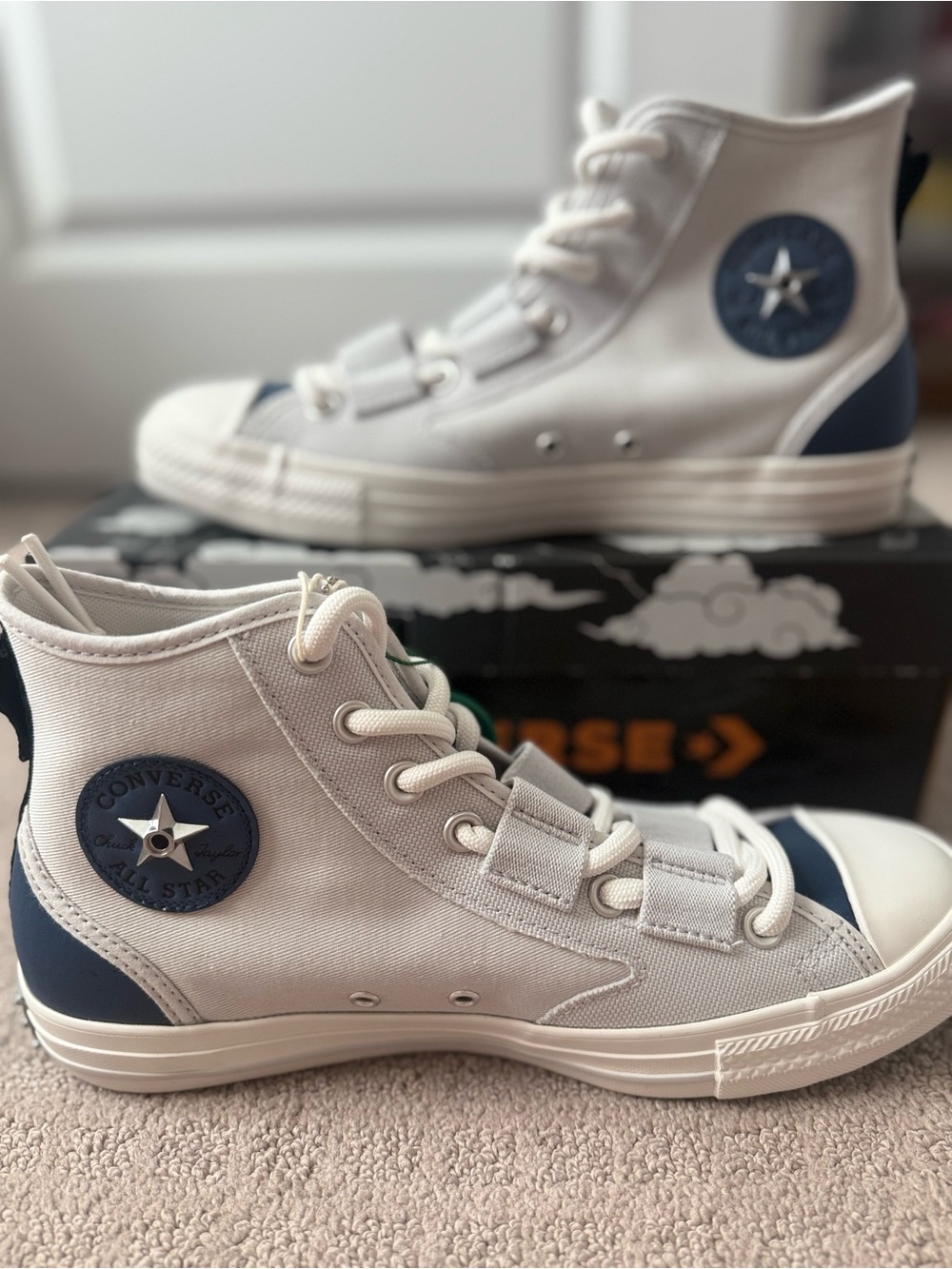 Converse High Top Sneakers in White and Navy